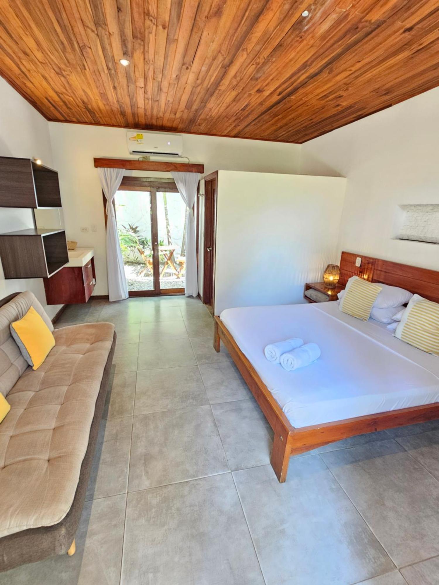 Makao Beach Hotel Паломино Стая снимка